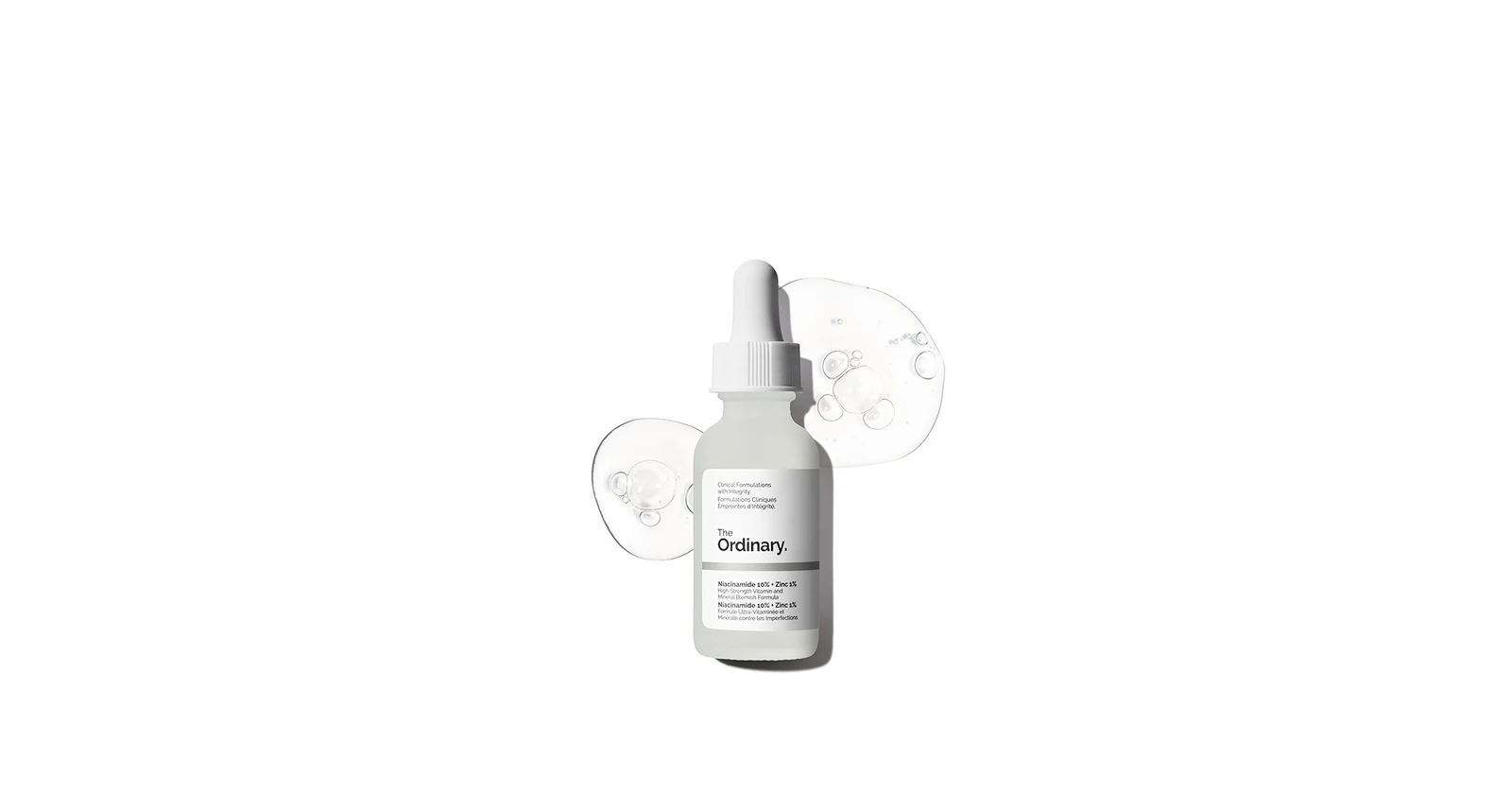 Sản phẩm serum The Ordinary Niacinamide 10% + Zinc 1% trong chai thủy tinh trắng, có đầu nhỏ giọt, nền trắng sạch sẽ.